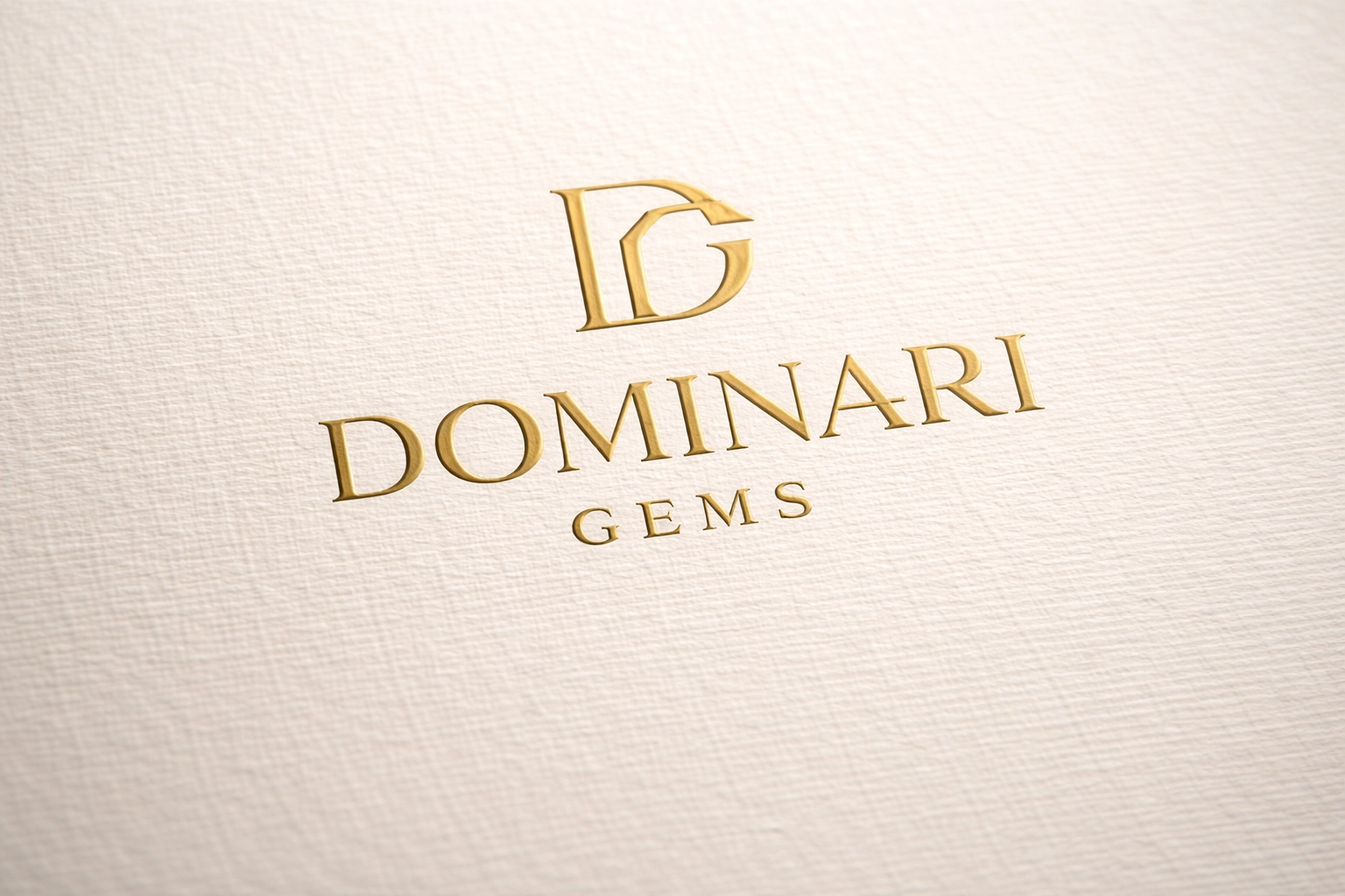 Luxury gold foil embossed “Dominari Gems” logo on premium linen paper with refined texture and soft lighting